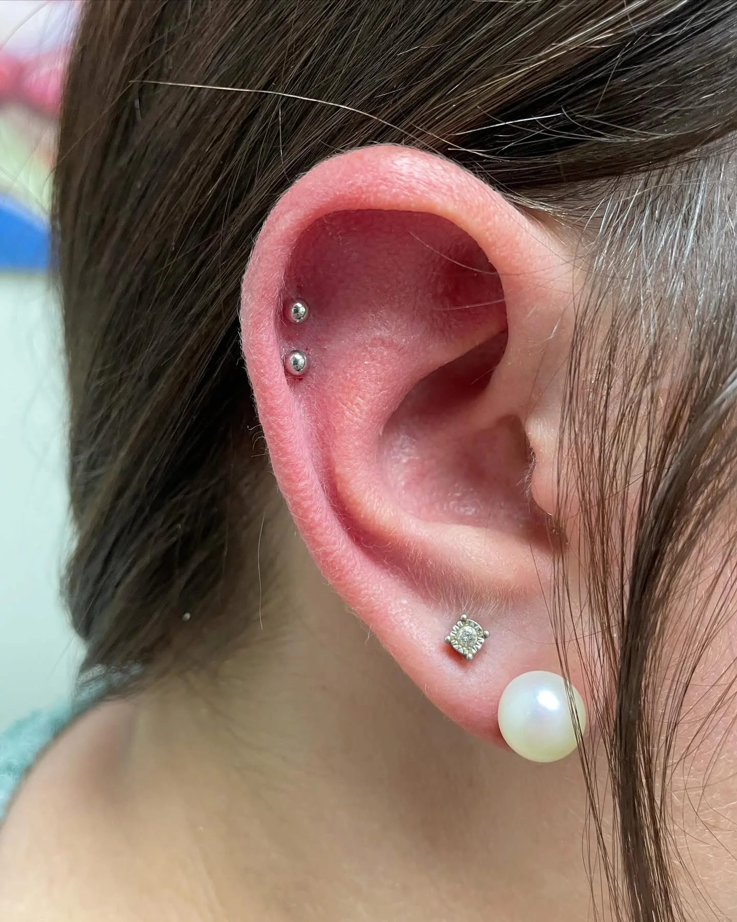 Front of a double helix — helix piercing